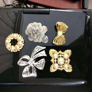 Women broches brand Monet